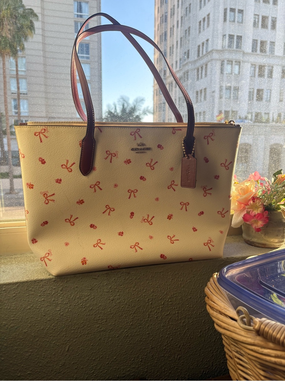 Coach Cream Tote with Pink Bow Print and Brown Handles